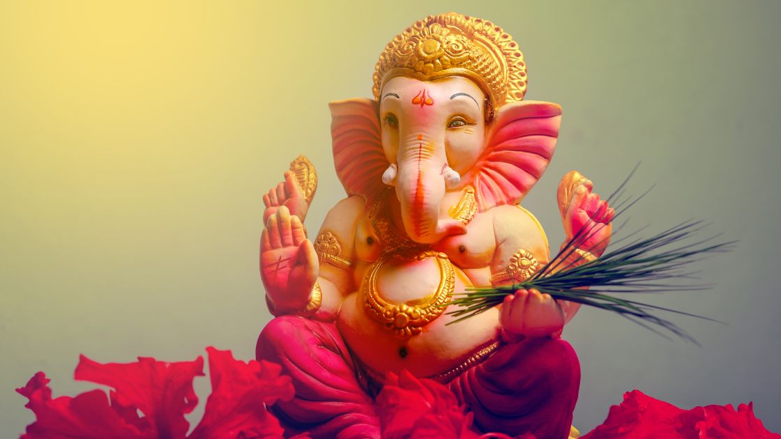 Why Is Lord Ganesha Offered Red Flowers and Blades of Grass